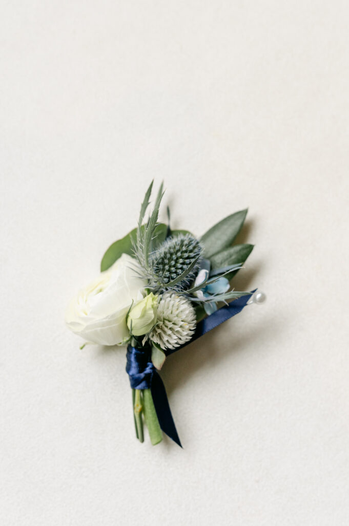 waterfront-wedding-yacht-club-elegant-flowers-modern-beautiful-connecticut-wedding-westchester-fairfield-county-stamford-floral-design-New-York-City-unique-white-flowers-boutonniere-white-blue