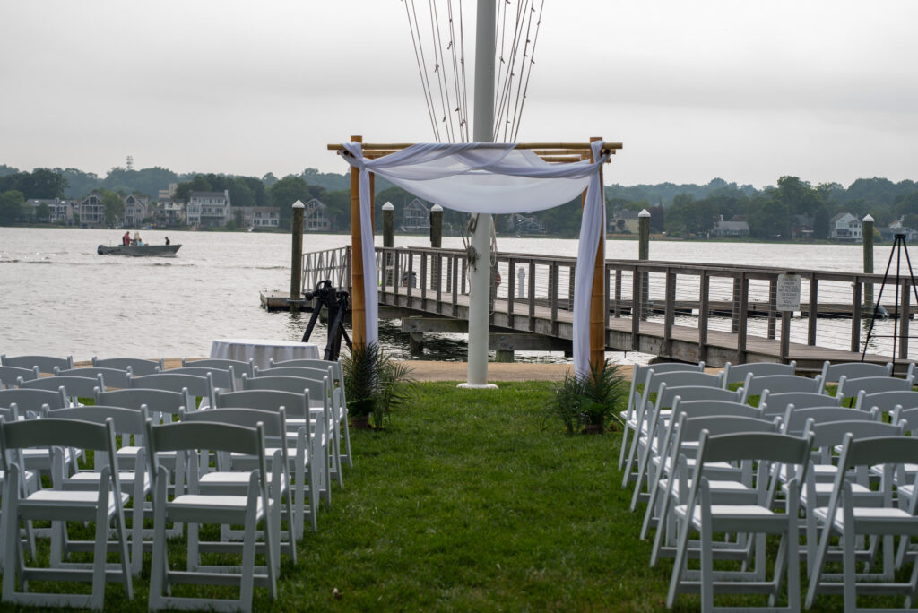 Chuppah-drapery-white-beautiful-wedding-long-island-sound-norwalk-ct-the-shore-and-country-club-fairfield-county-waterfront-cocktail-reception-roses-pink-anemone-garden-design-english-anemone-coral-reception-outdoor-connecticut-westchester-bamboo