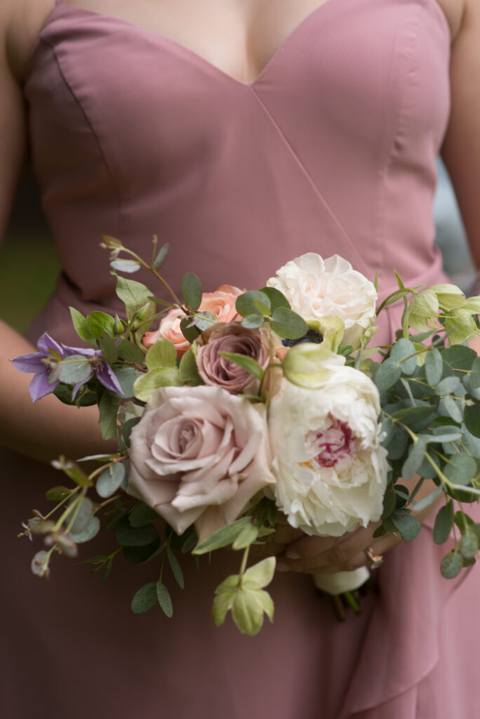 Victorian-wedding-reid-castle-romantic-Dutch-Masters-floral-designer-design-garden-English-luxury-unique-flowers-westchester-county-fairfield-county-wilton-connecticut-new-york-city-manhattan-arbor-roses-arch-artist-peonies-cake-decoration-bud-vases-ranunculus-poppies-local-elegant-blueberries-anemone-british-seasonal-flowers-florist-weddings-purchase-new-york-bridesmaid-bouquet