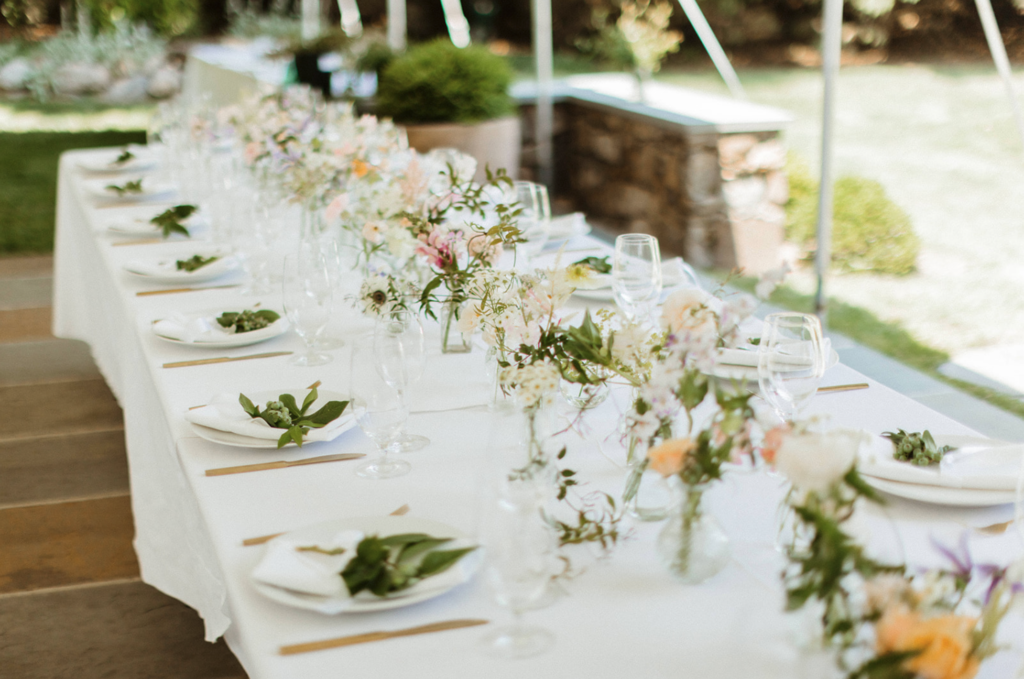 Luxury-wedding-garden-beautiful-unique-flowers-summer-tent-white-pastels-westchester-connecticut-country-design-fairfield-county-tablescape-dream-classic-bride-nyc-stunning-bud-vases-blueberries-seasonal-local-elegant-ranunuculus-roses-clematis-tent-anemone-jasmine-floral-design-designer-artist
